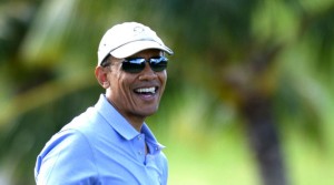 Obama Enjoys a round of Golf during his Hawaiian Vacation, Hawaii - 23 Dec 2013