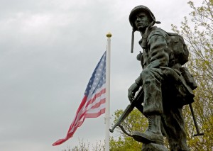 The statue of "Iron Mike" standing in a field at La Fiere, near Sainte-Mère-Église represents the paratroops of the 82nd and 101st Airborne Divisions who fought in the area.